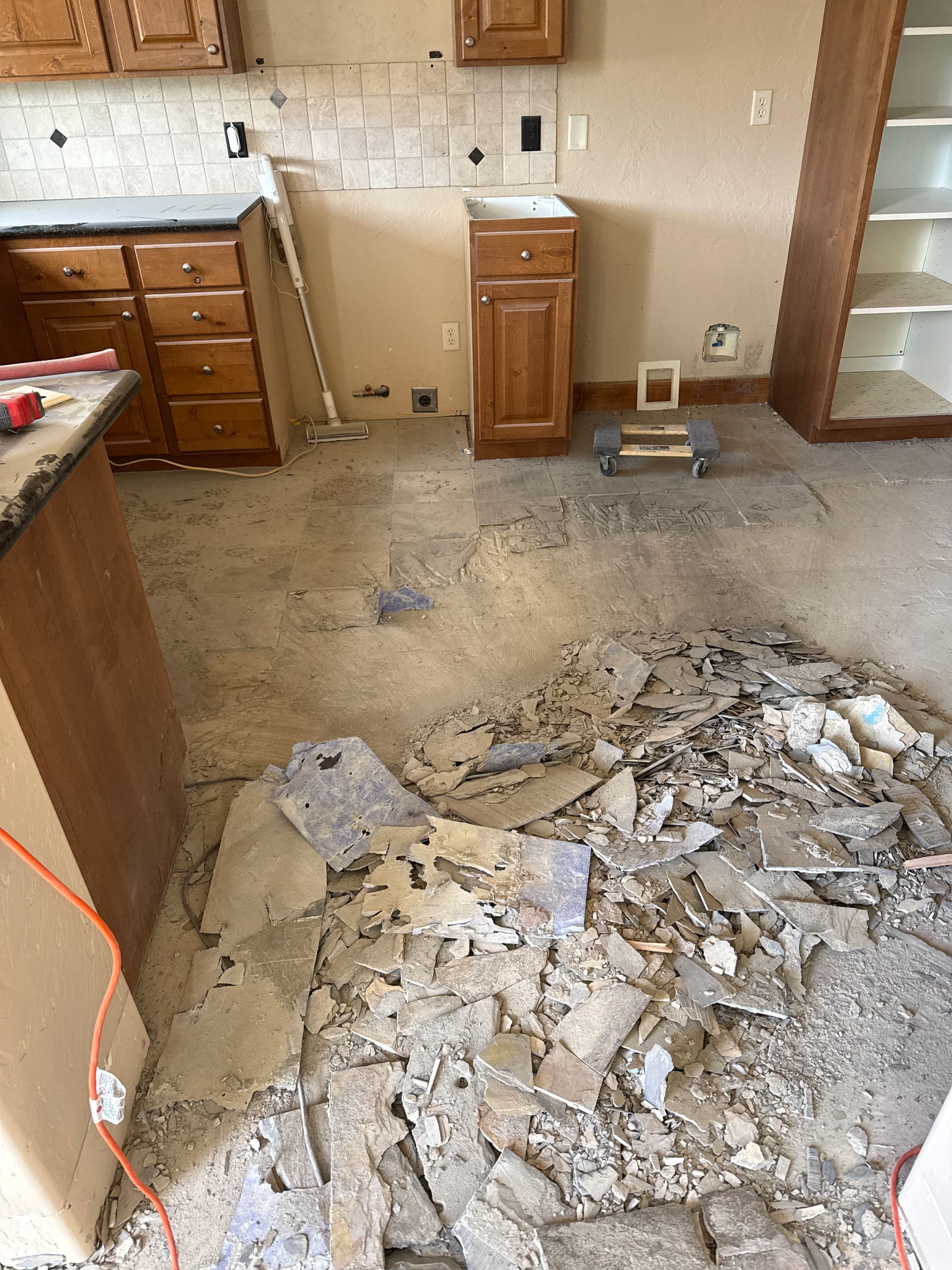 Demo Day - Old Tile and Carpet Out, New Floors Coming In