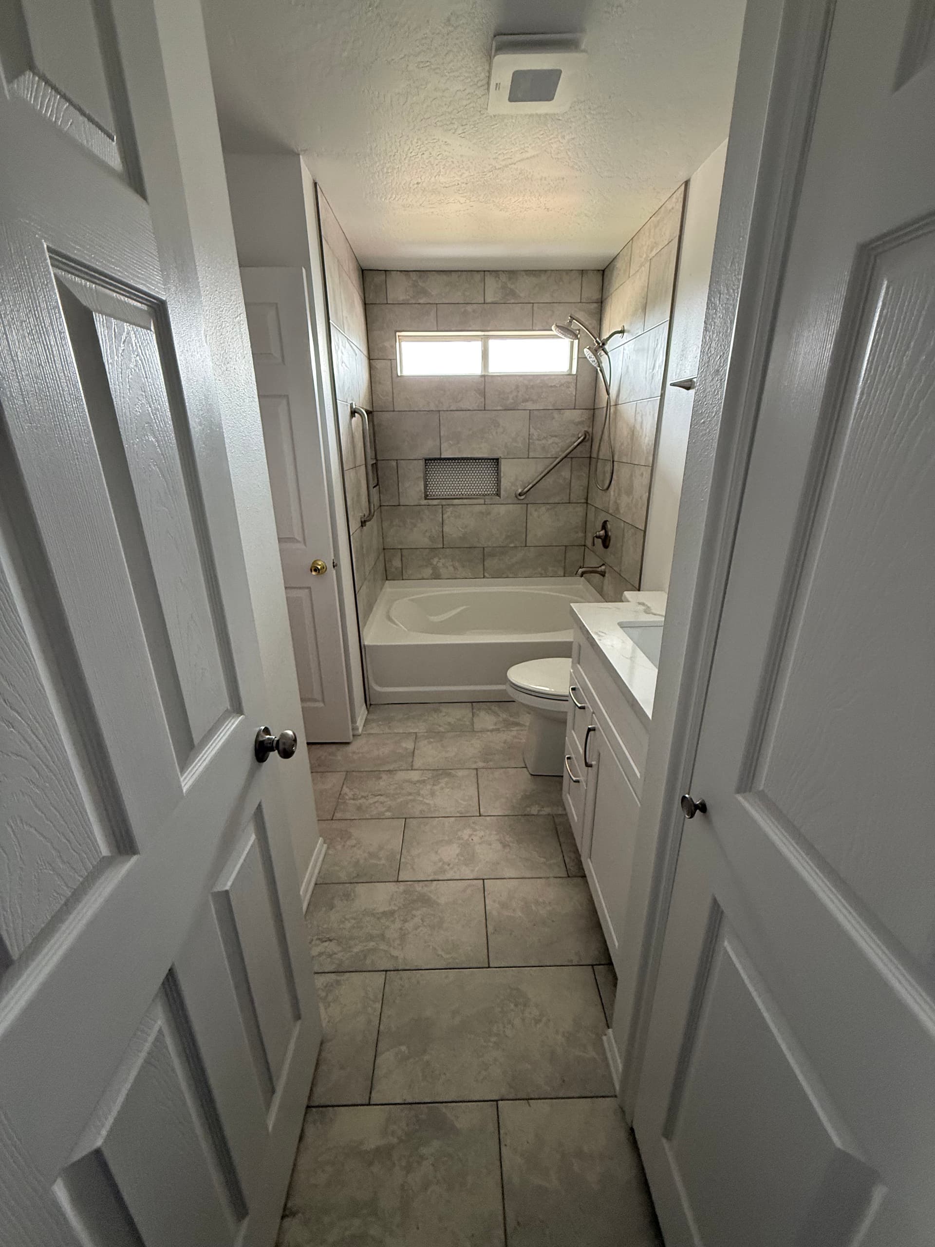 Gallery photos for Outdated Beige Bathroom Gets a Clean Modern Refresh: Image #3