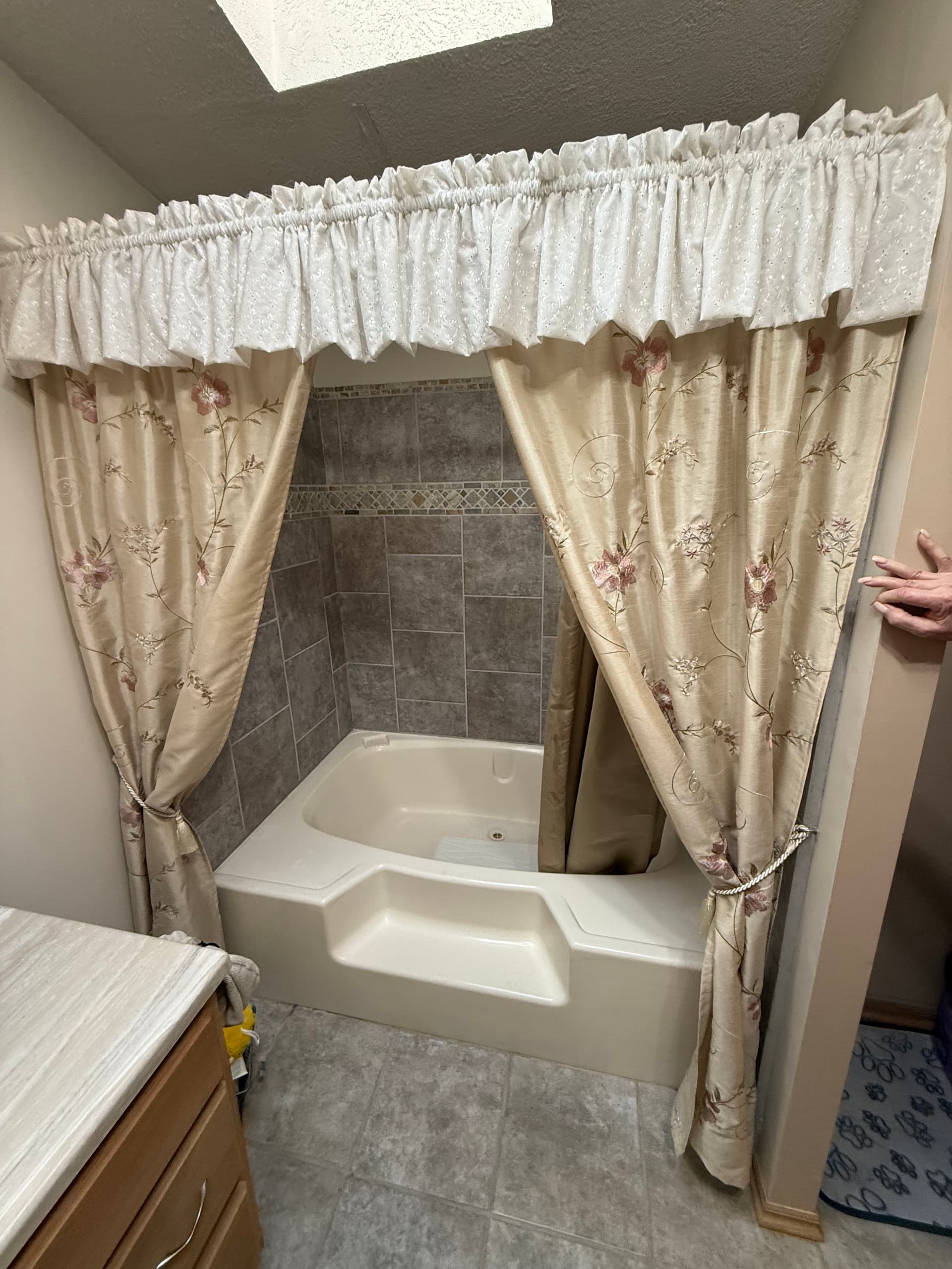 River Rock and marble tub to walk-in shower conversion image