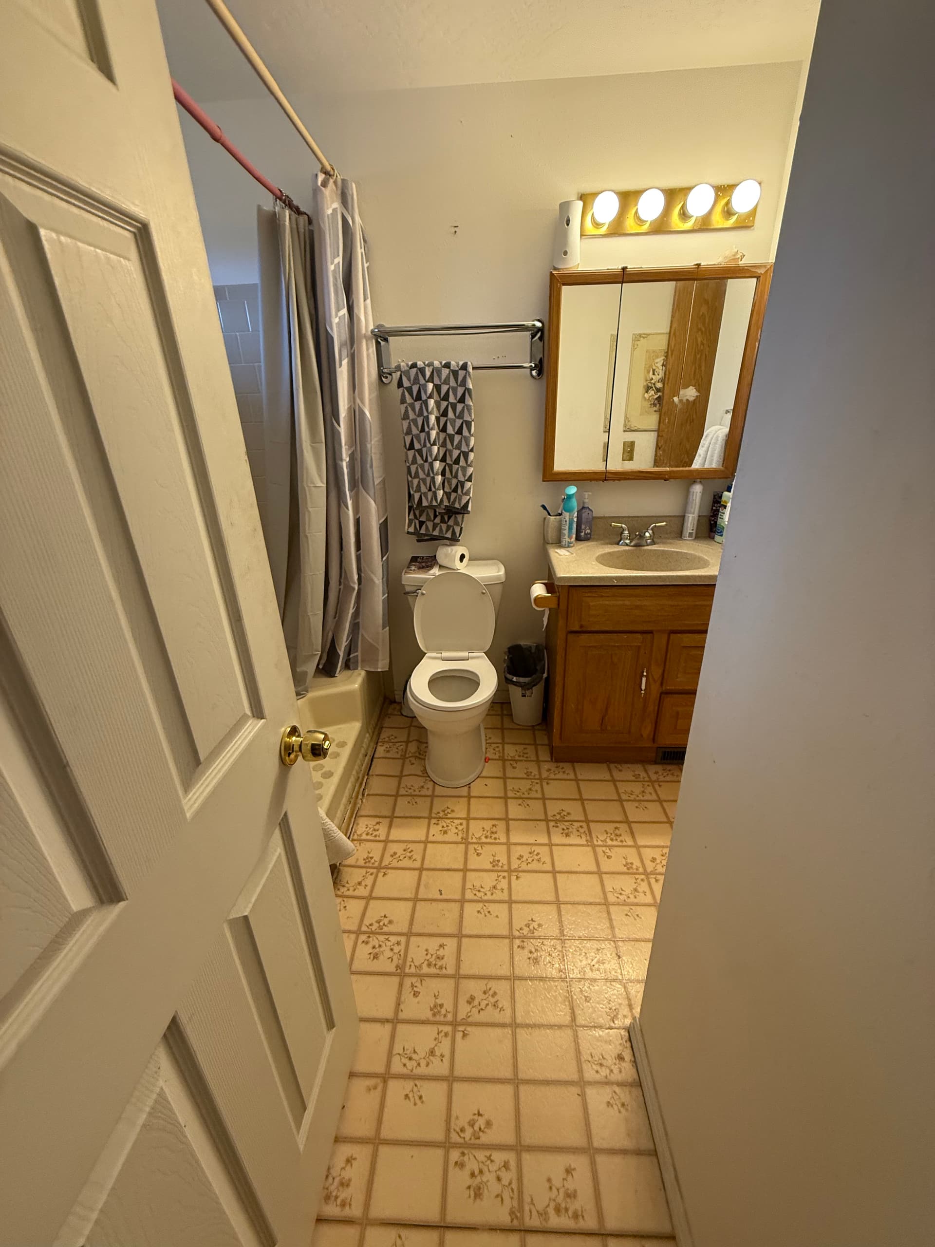Gallery photos for Outdated Beige Bathroom Gets a Clean Modern Refresh: Image #1