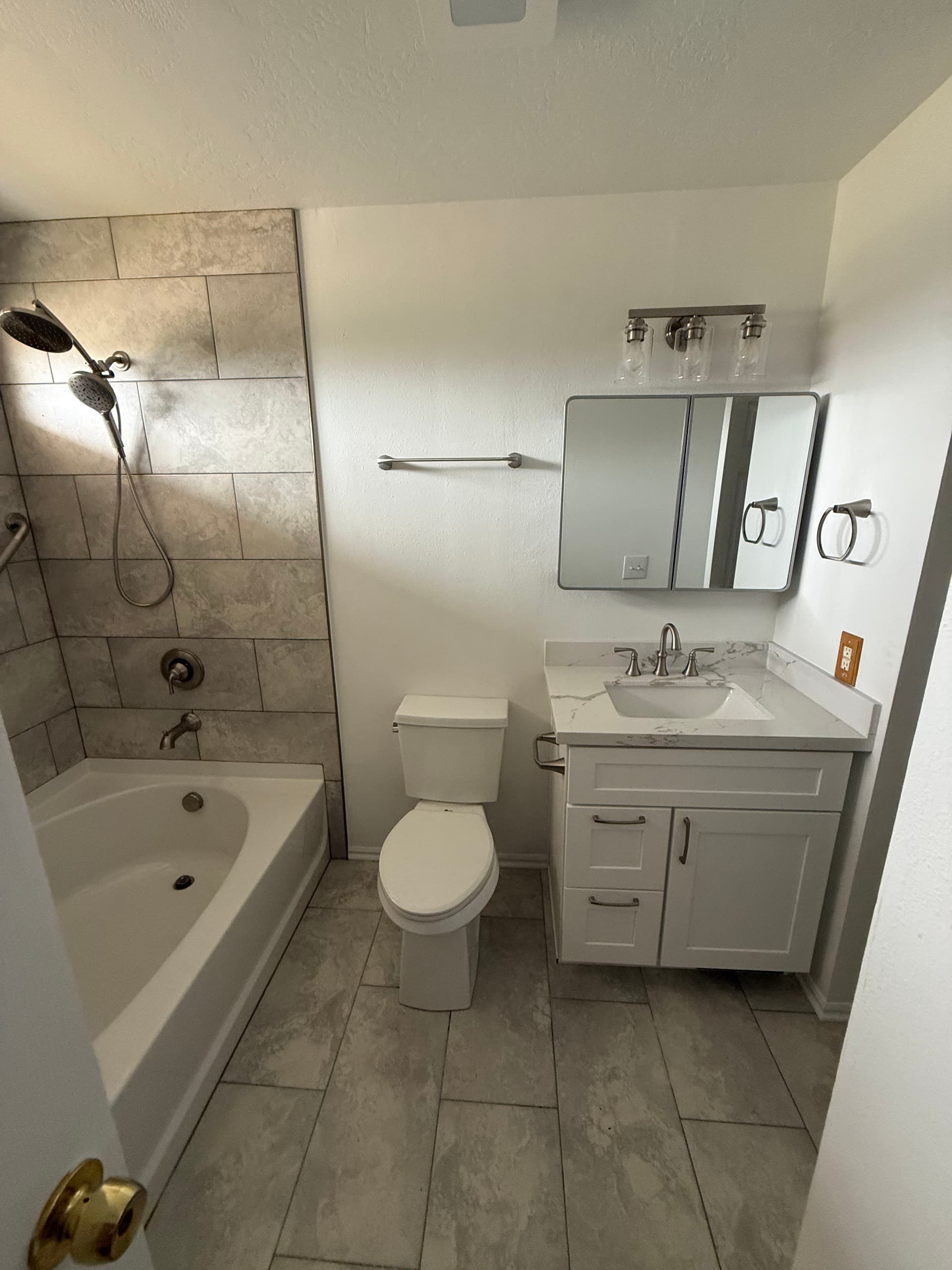 Gallery photos for Outdated Beige Bathroom Gets a Clean Modern Refresh: Image #2