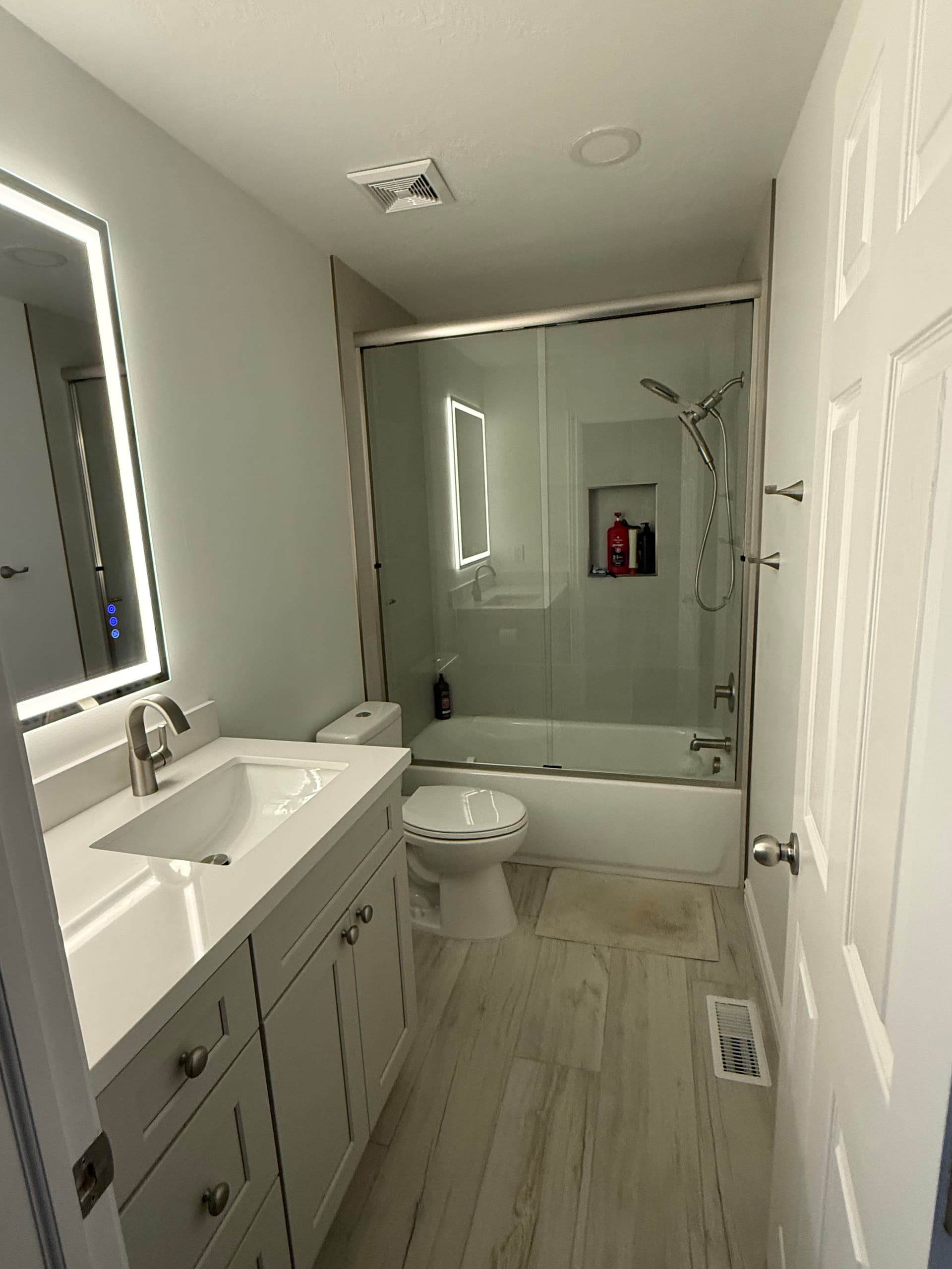 Gallery photos for Two Outdated Bathrooms Get a Complete Modern Overhaul: Image #1