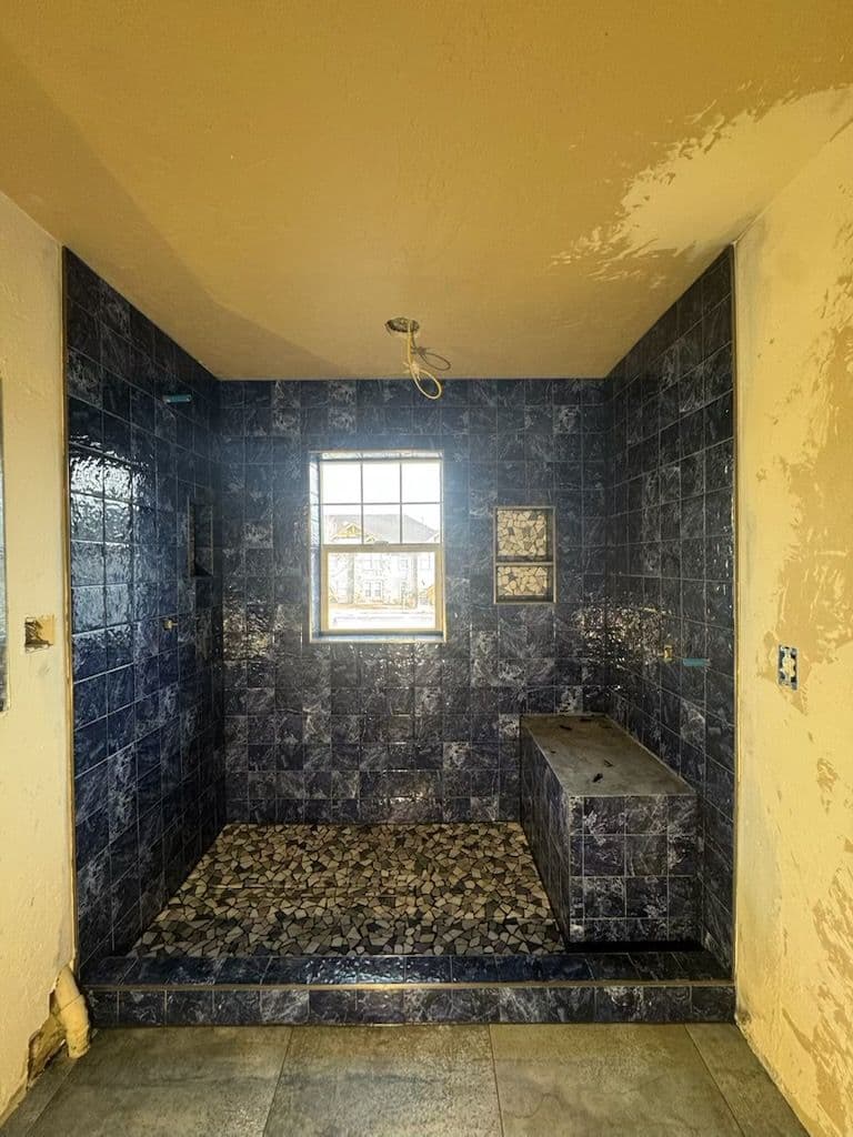 Gallery photos for Crafting a Stunning Custom Shower with Stone and Pebble Accents: Image #1