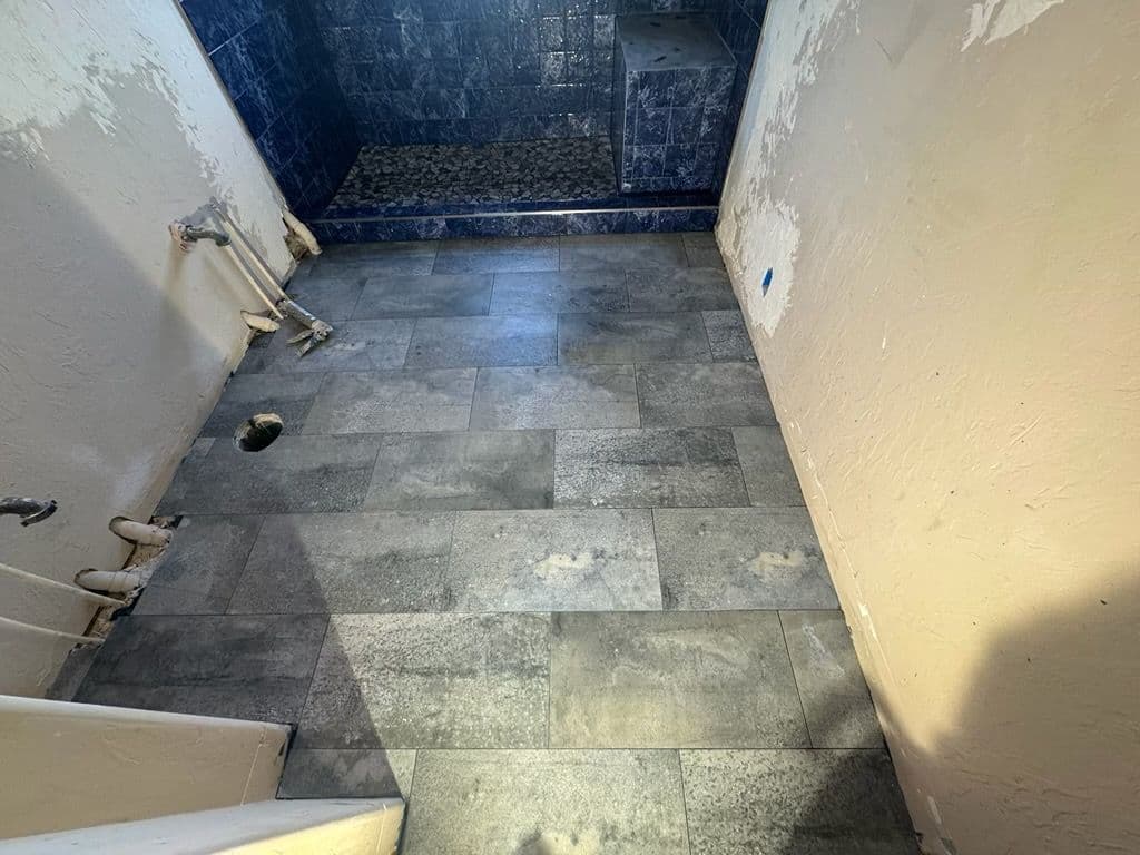 Gallery photos for Crafting a Stunning Custom Shower with Stone and Pebble Accents: Image #2