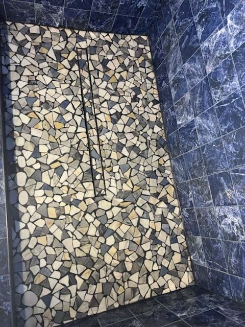 Gallery photos for Crafting a Stunning Custom Shower with Stone and Pebble Accents: Image #3